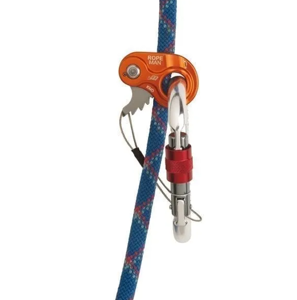the wildcountry ropeman 1 in orange, shown on a rope with a carabiner