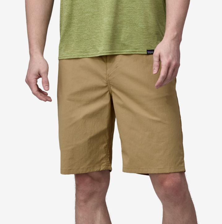 patagonia mens quandary short in classic tan, front view on a model