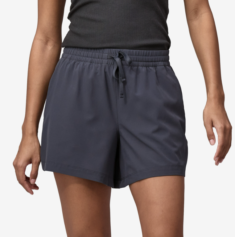 the patagonia womens fleetwith shorts in the color smolder blue, front view on a model