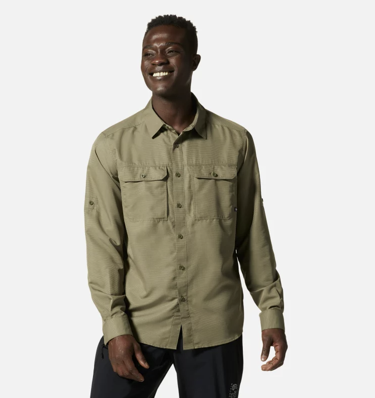 The mountain hardwear mens canyon long sleeve shirt in the color stone green, front view on a model