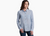 a model wearing the kuhl womens adele long sleeve shirt in the color blue storm, front view