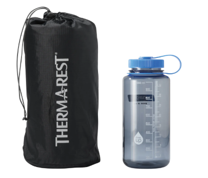 thermarest trail scout in stuff sack next to nalgene