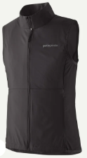 A sleeveless black zip-up vest with a stand collar, shown against a plain white background. The brand name 'patagonia' is visible in small white text on the left chest.