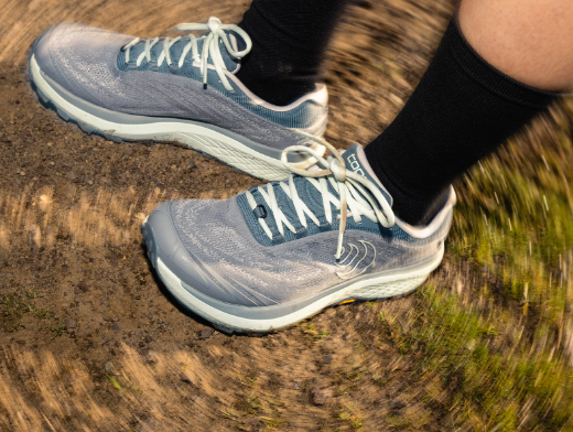 the topo womens pursuit 2 shoe in color grey mint, view on a model