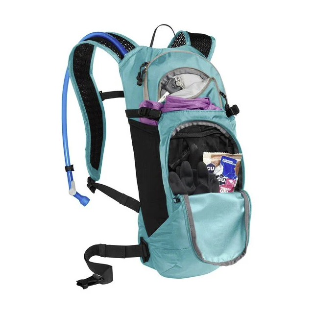 the womens camelback lobo 9 pack in the color latigo teal, view of the pack stuffed with things
