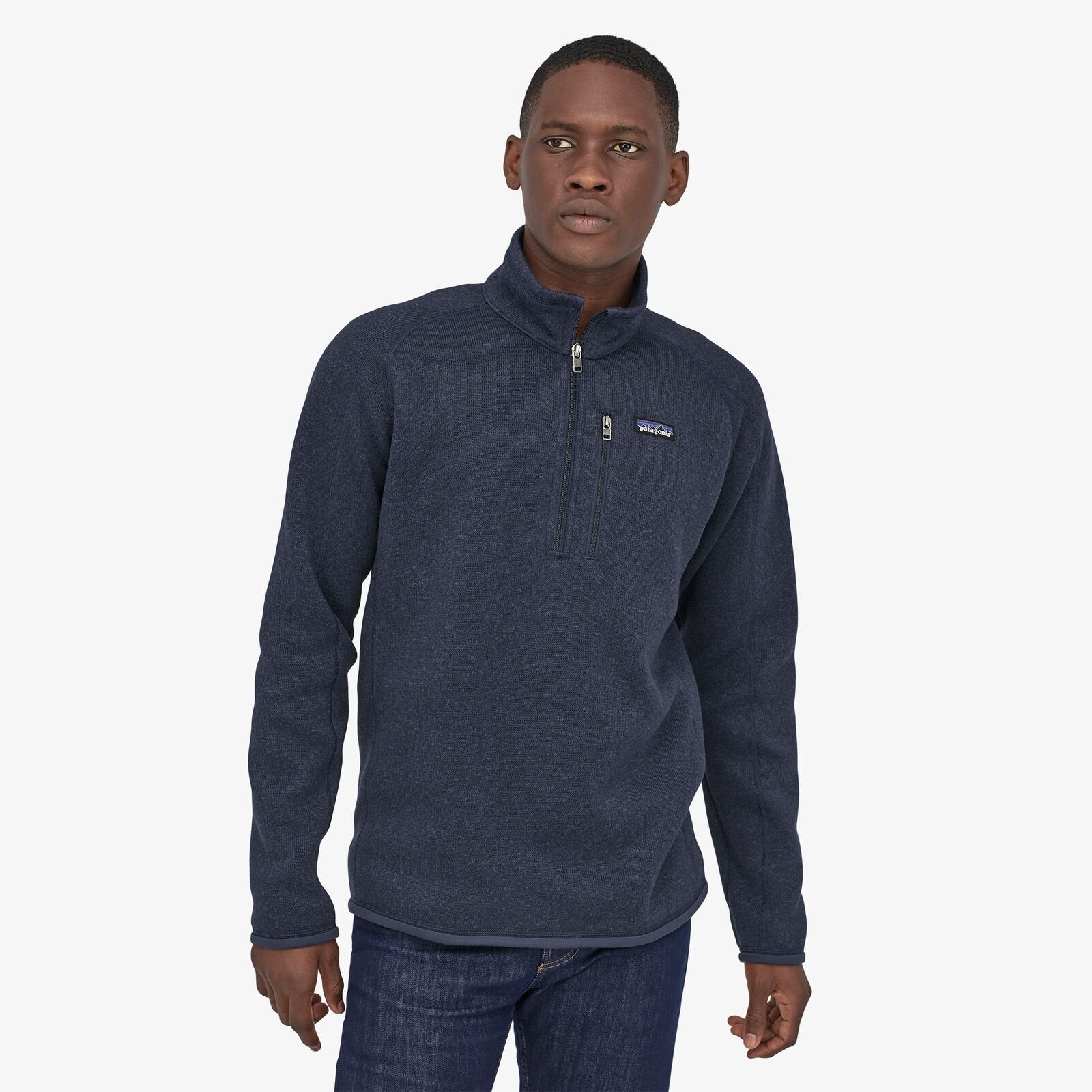 a model shows the better sweater zip in navy from the front