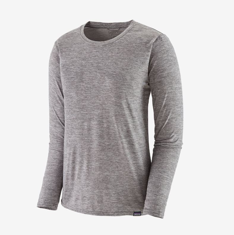 a front view of the patagonia womens long sleeve capilene cool daily shirt in the color feather grey
