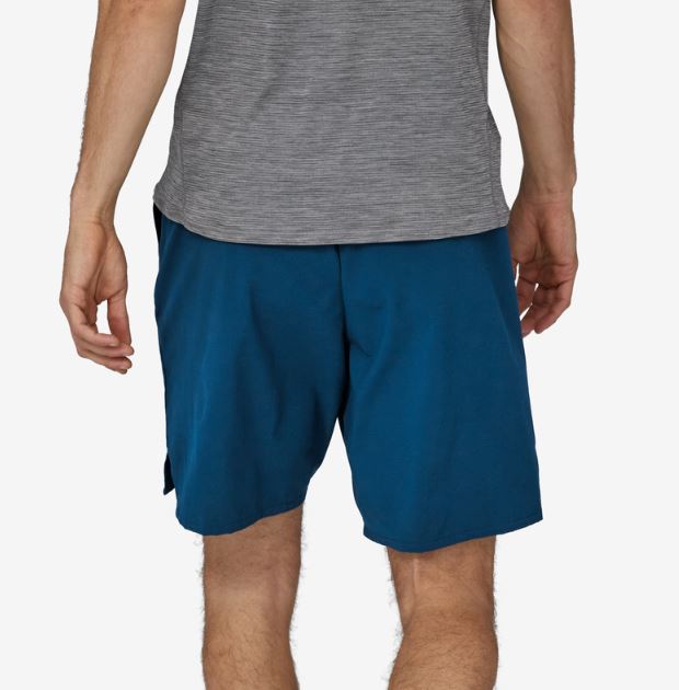 patagonia mens multi trails shorts in lagom blue, back view on a model