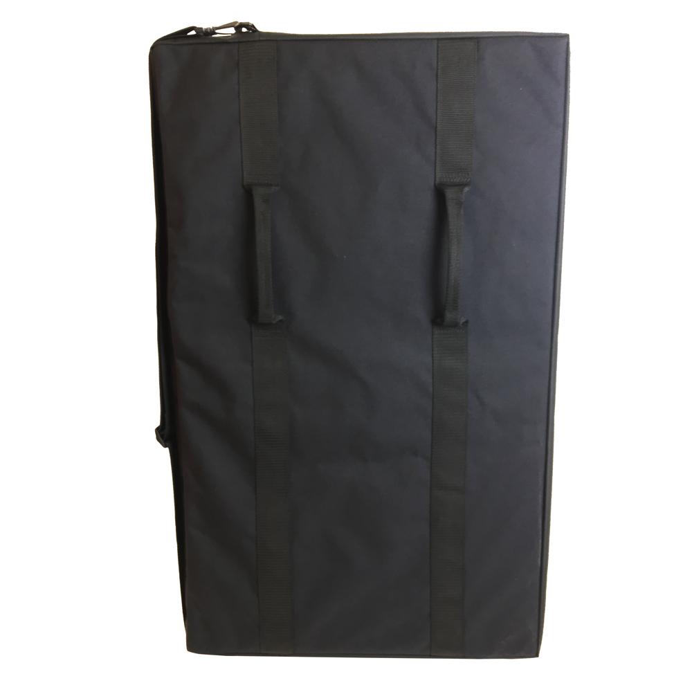 a black pro spotter folded and showing the carry straps