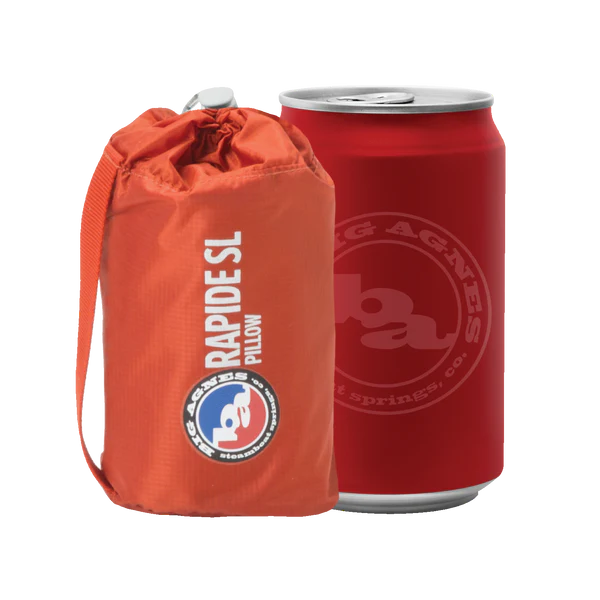 the pillow, stuffed and next to a 12 ounce can. It's about the same size. 