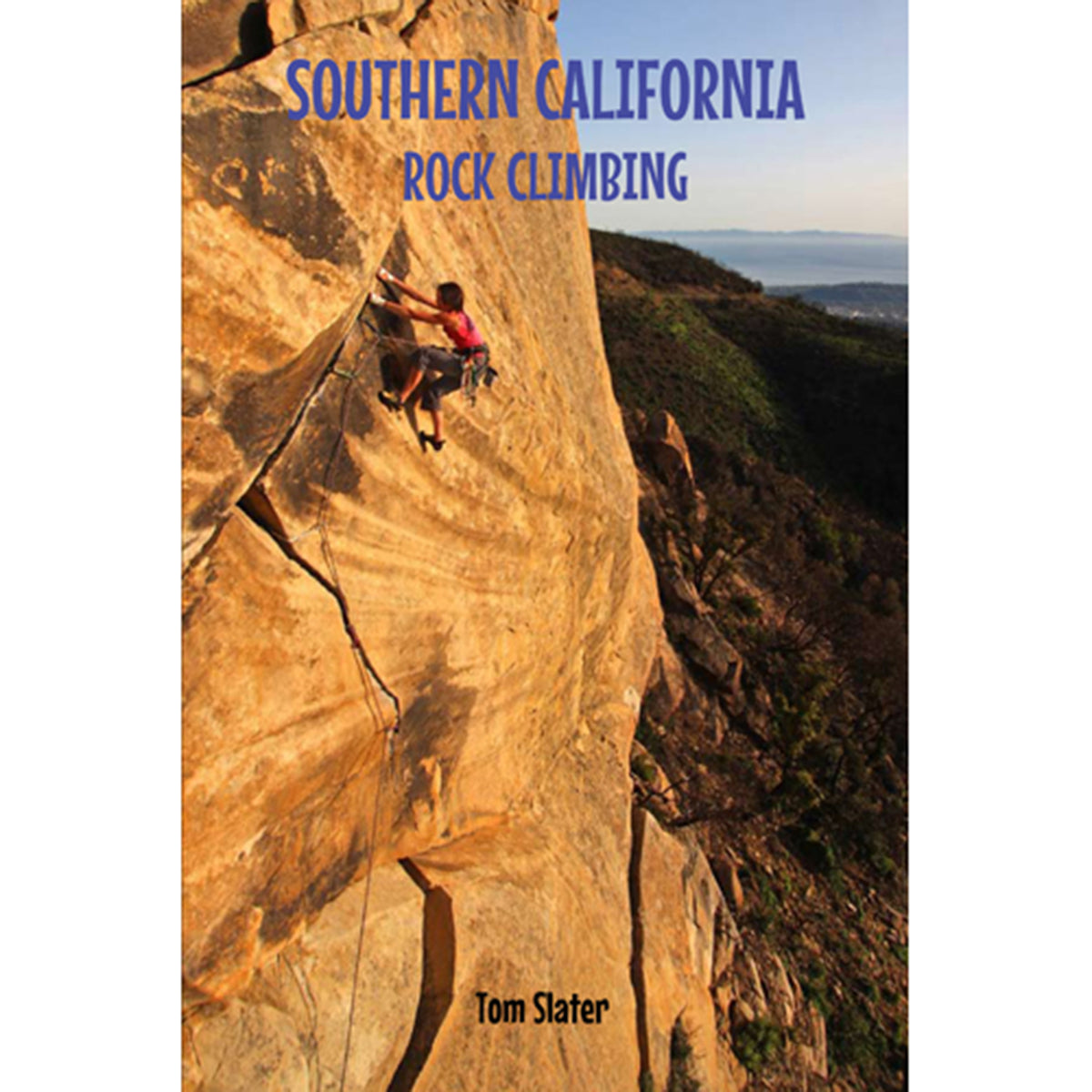 a women leads a zig zagging crack climb on the cover of the southern california rock climbing guidebook