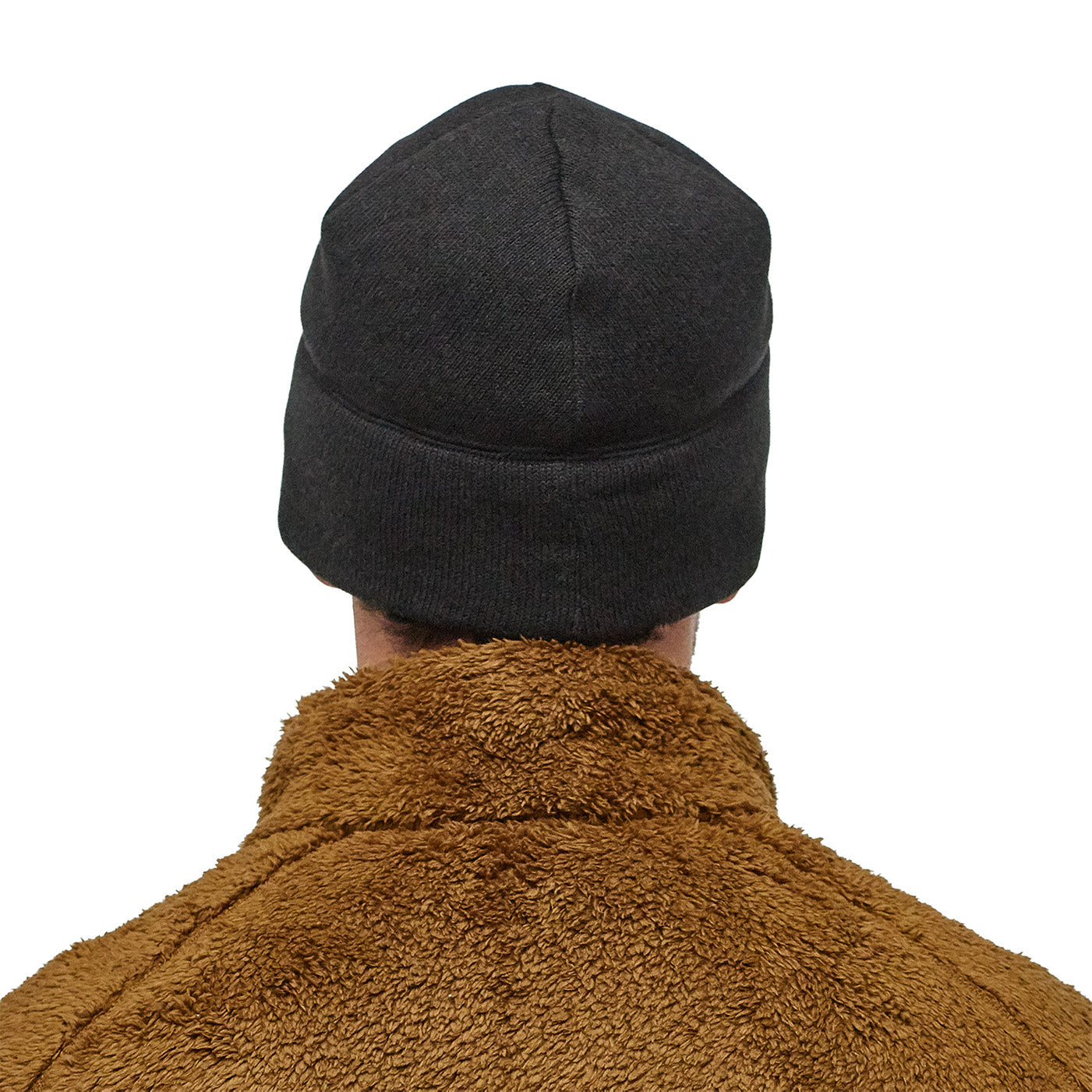 a model pictured from behind wearing the better sweater beanie