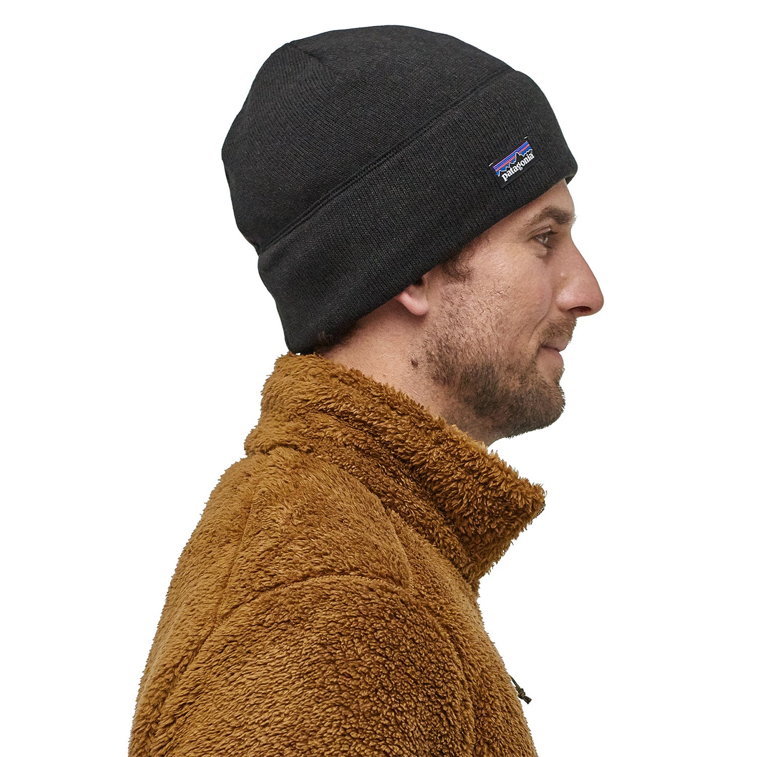 side view showing a model wearing the better sweater beanie