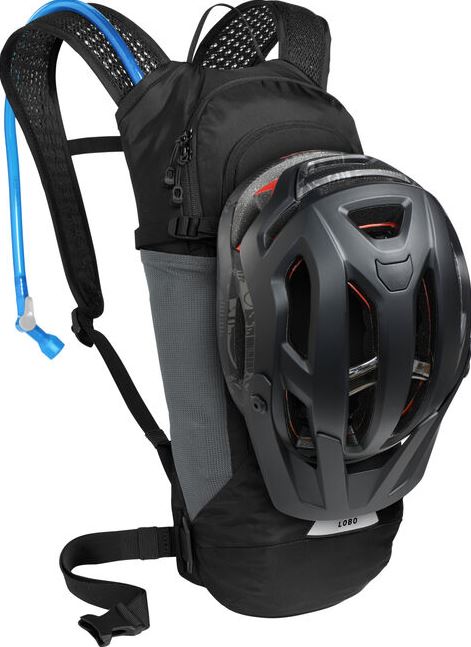 camelbak lobo 9 hydration pack in black, view with a helmet attached