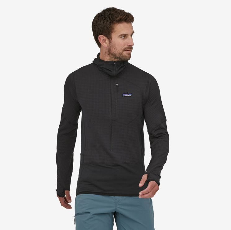 patagonia mens r1 fleece pullover hoody in black, front view on a model