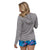 patagonia women's capilene cool daily hoody in feather grey on model, back view