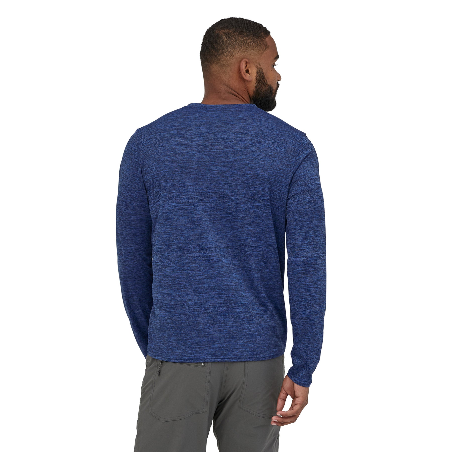 patagonia mens long sleeve capilene cool daily shirt in viking blue navy blue x dye on a model, back view