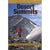 a  man stands with a high mountain above tree line with some snow behind him on the cover of the desert summits book