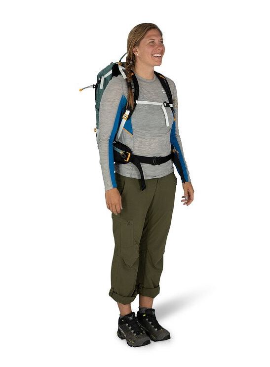 osprey sirrus 24 backpack in succulent green, front view on a model