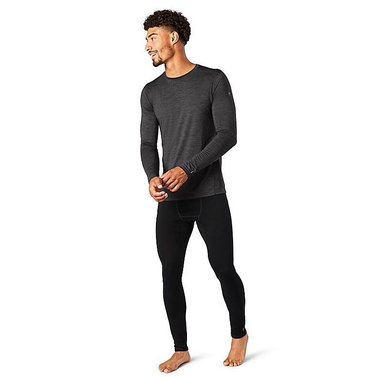 a photo of the men's smartwool classic all season merione base layer long sleeve in the color iron heather, front view on a model