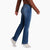 kuhl kontour flex denim straight jeans womens on model side view in color denim blue with light fade