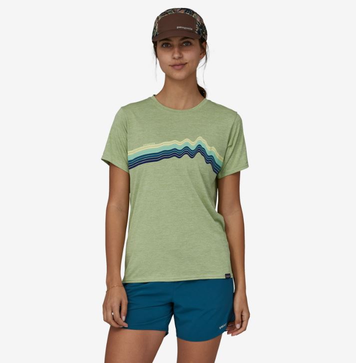 a photo of the patagonia womens multi trails shorts with a five and a half inch inseam in the color lagom blue, front view on a model
