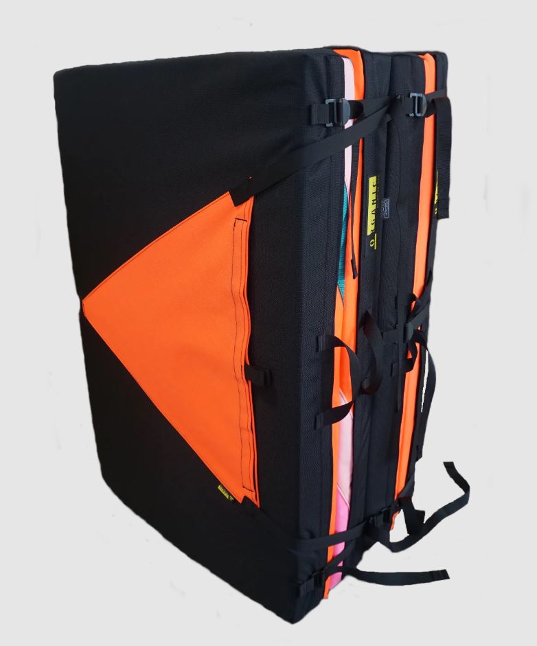 a photo of an organic load strap being used to hold crash pads together