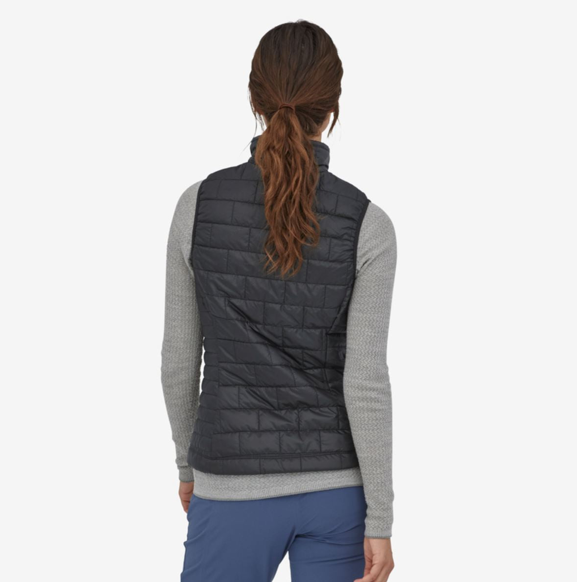 patagonia womens nano puff vest in black, back view on a model