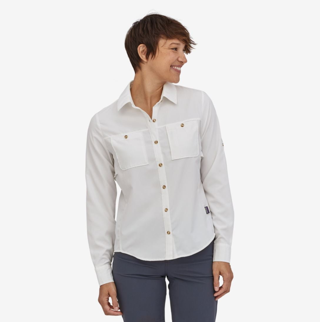 patagonia womens self guided hike long sleeve shirt in white, front view on a model