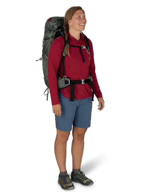 osprey eja 58 backpack in grey, front view on a model