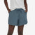 a photo of the patagonia womens fleetwith short in the color plume grey, front view on a model