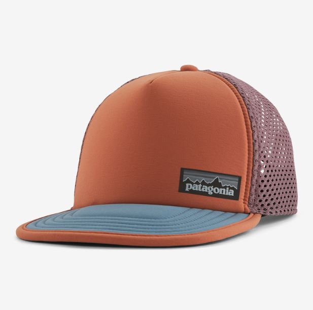 a photo of the patagonia duckbill trucker hat in the color quartz coral