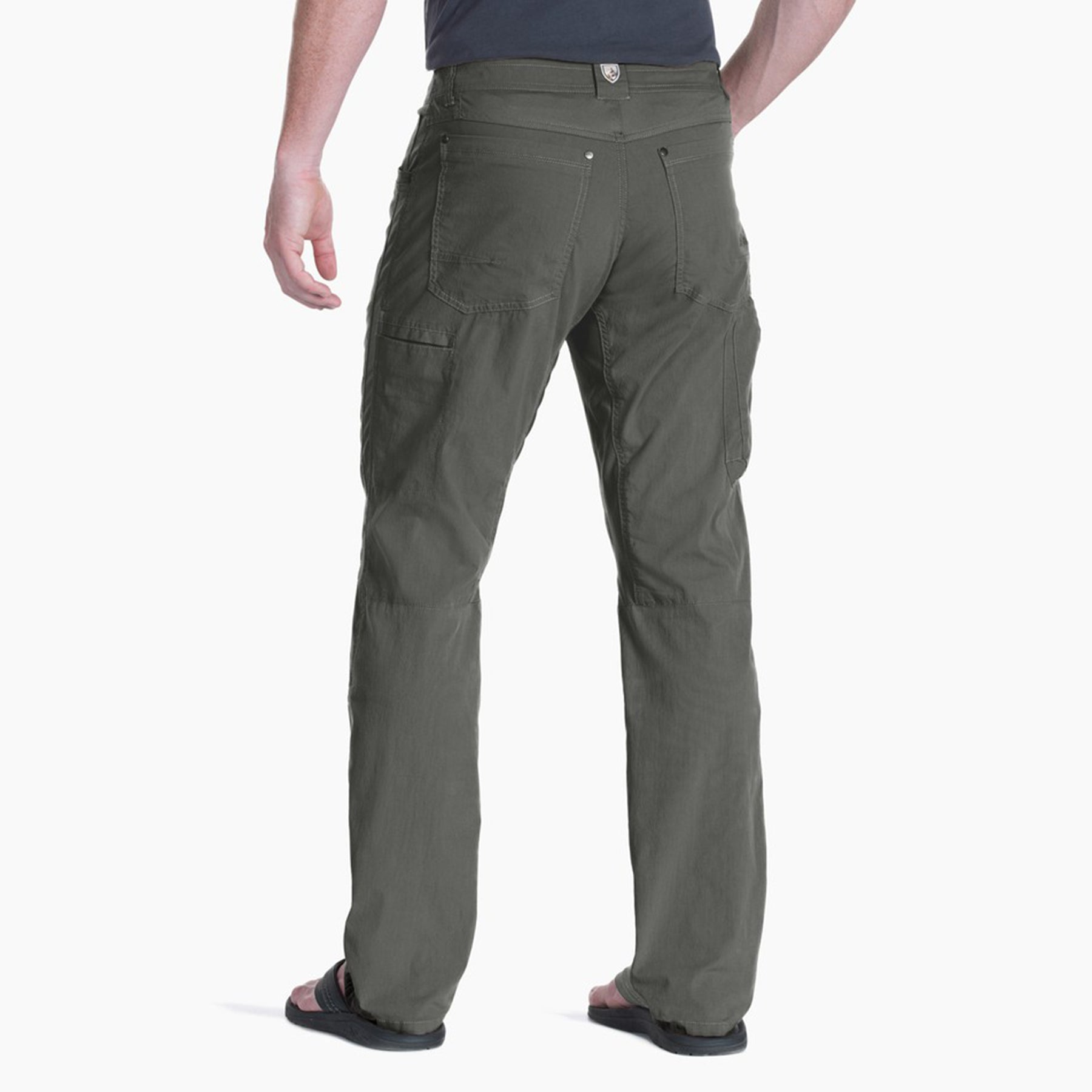 kuhl radikl pants mens on model back view in color green