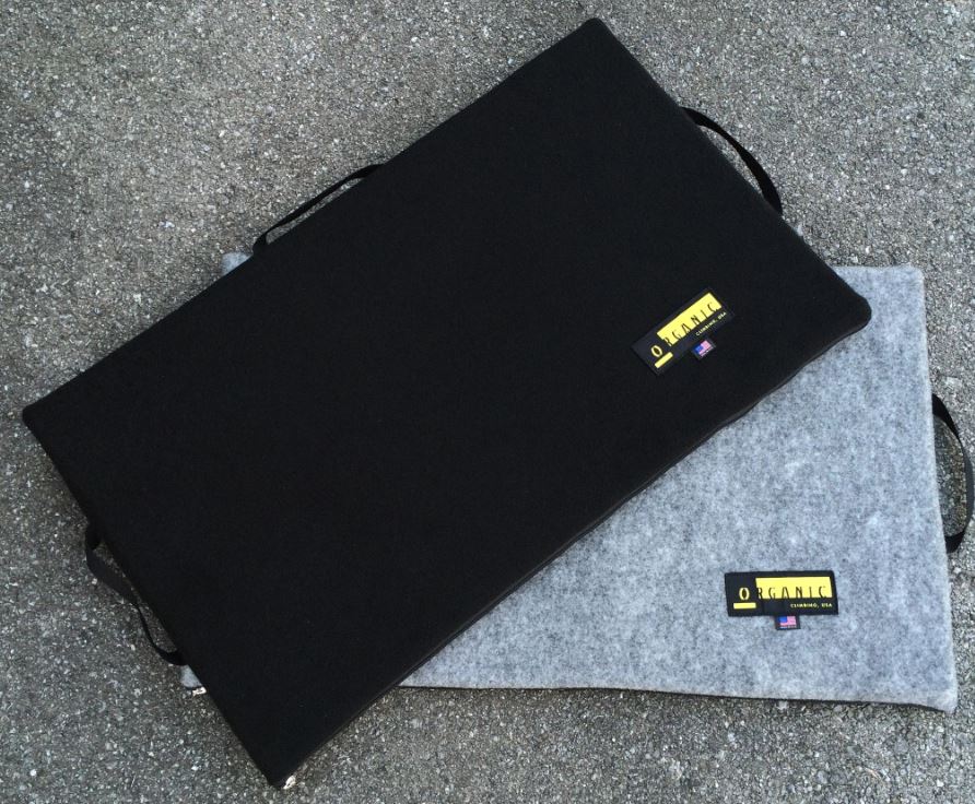a photo of a black and grey organic slider pad
