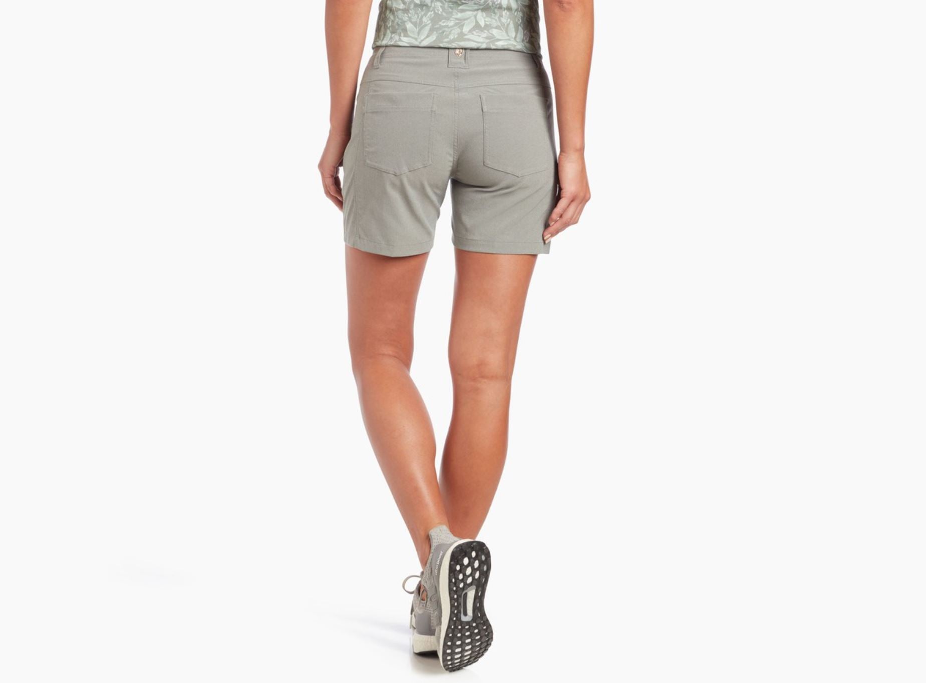 kuhl womens trekr 5 inch shorts on a model, back view in stone
